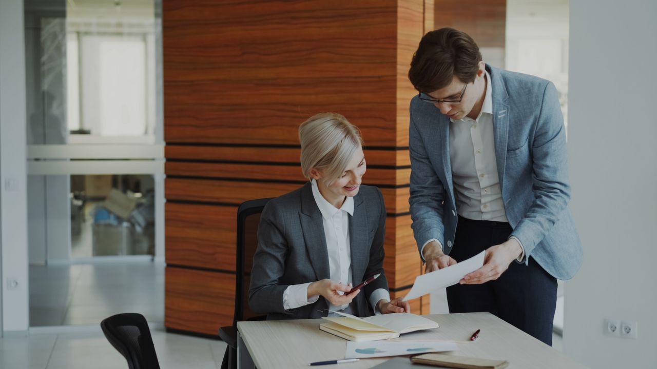 A workplace adviser meeting with a business manager