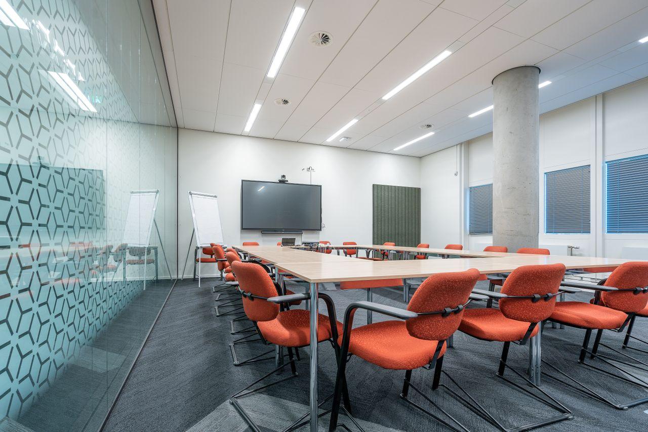 A trainer delivering a practical workplace session